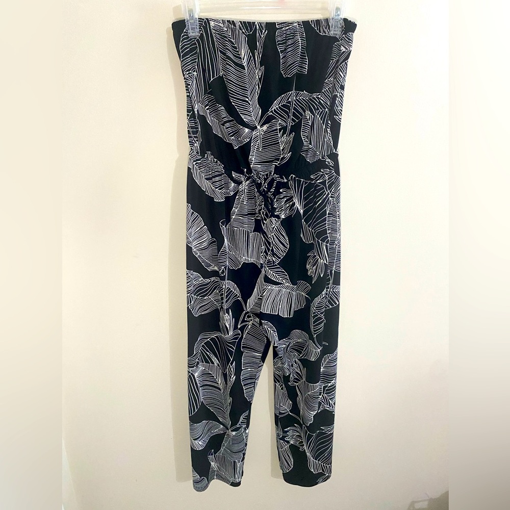 Express medium sleeveless romper. Black with white print.